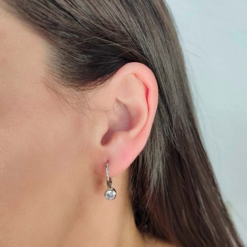 Aros de Plata de Ley rodiada de 15mmØ y 1,5mm de grosor del que cuelga una pequeña circonita de 6mm engastada en chatón. Unos pe 2