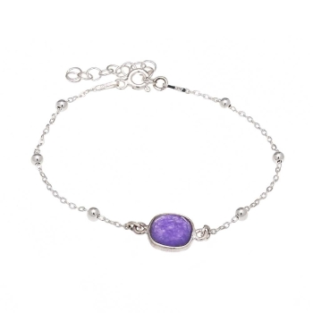 Pulsera fabricada de forma artesanal con una preciosa piedra de amatista natural tallada por ambos lados y engastada en bisel de