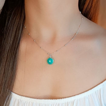 Colgante fabricado de forma artesanal con una preciosa piedra de amazonita facetada por ambas caras y engastada en bisel de Plat 2