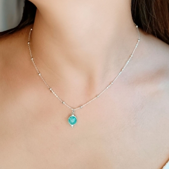 Colgante fabricado de forma artesanal con una preciosa piedra de amazonita facetada por ambas caras y engastada en bisel de Plat 2