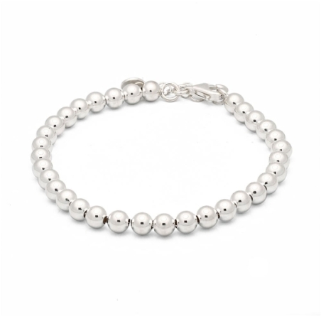 Clásica y actual pulsera de Plata de Ley de bolas de 5mm, enfiladas en cadena interior de 18cm más 3 de cadena de alargar. Versá