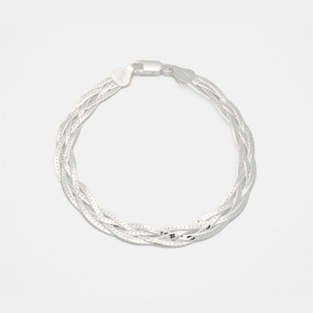 Original pulsera en Plata de Ley con cuatro finas cadenas tipo magic que se trenzan, formando una pieza espectacular, que no pas