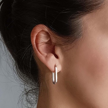Aros de Plata de Ley rodiada, con forma oval de unos 25mm de largo. Sus lineas armoniosas, su perfecta hechura y su terminación  2