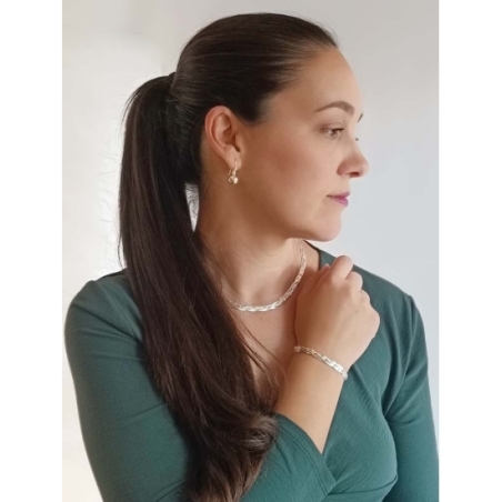 Original pulsera en Plata de Ley con cuatro finas cadenas tipo magic que se trenzan, formando una pieza espectacular, que no pas