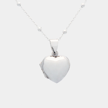 Romántico colgante guardapelo en Plata de Ley que no pierde su actualidad. Este que te presentamos de forma de corazón, de 16,6x