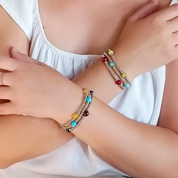 Pulsera de bolitas de Plata de Ley de 3 y 4mm enfiladas en hilo de silicona con 4 bolas de 8mm de Ónice que componen una pieza m 2