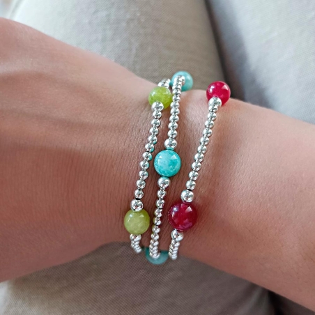 Pulsera de bolitas de Plata de Ley de 3 y 4mm enfiladas en hilo de silicona con 4 bolas facetadas de 8mm de Ágata verde que comp