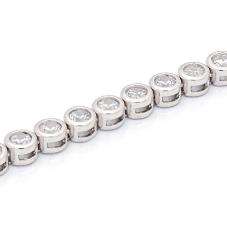 Pulsera de Plata de Ley rodiada con circonitas de 4,5mmØ engastadas en chatón, con un largo tota de 18cm y rematada con uñeta y 