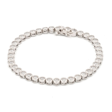 Pulsera de Plata de Ley rodiada con circonitas de 4,5mmØ engastadas en chatón, con un largo tota de 18cm y rematada con uñeta y 