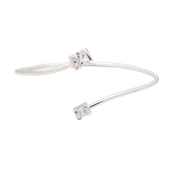Pulsera brazalete de plata con dos circonitas, una mas grande (6x6mm) y la otra algo mas pequeña (4x4mm), en color blanco. Adapt